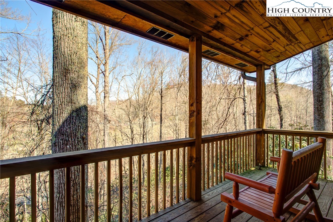 186 Riversound Drive Banner Elk, NC 28604 - Photo 18 of 45 a view of a two chair in the balcony