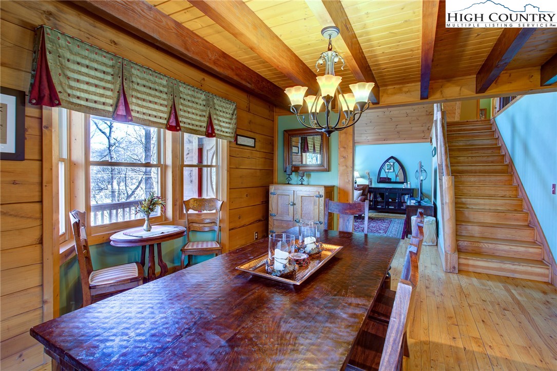 186 Riversound Drive Banner Elk, NC 28604 - Photo 21 of 45 a living room filled with furniture and a table