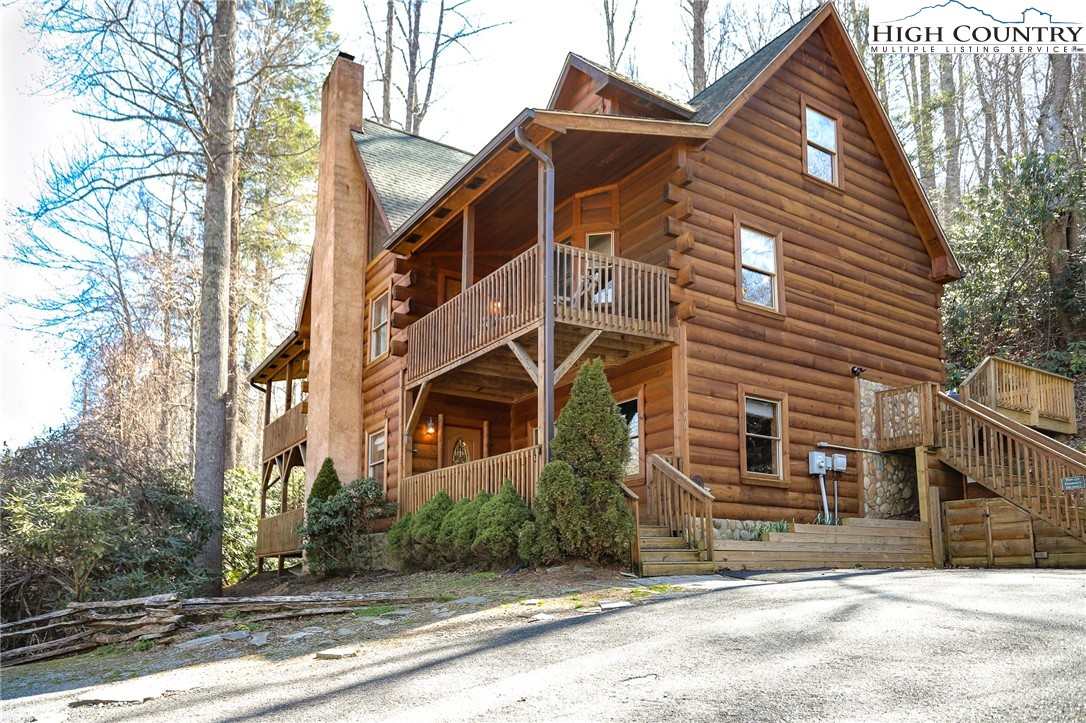 186 Riversound Drive Banner Elk, NC 28604 - Photo 44 of 45 a front view of a house with a yard
