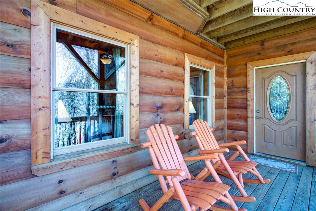 186 Riversound Drive Banner Elk, NC 28604 - Photo 9 of 45 a view of a two chairs in the balcony