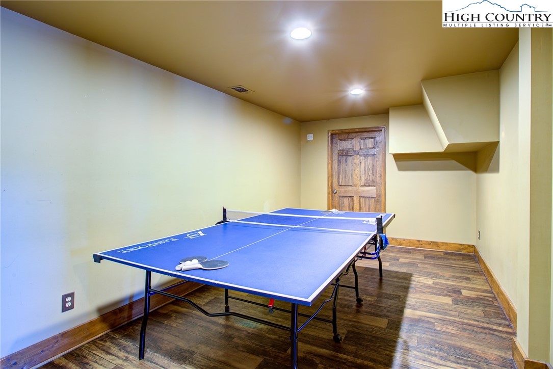 186 Riversound Drive Banner Elk, NC 28604 - Photo 10 of 45 a view of a dining room with furniture and wooden floor