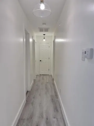 a utility room with sink dryer and washer