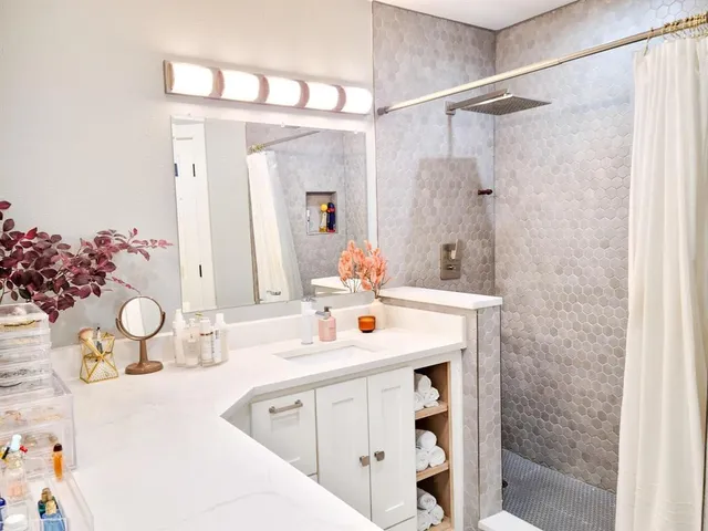 a bedroom with a bed and furniture