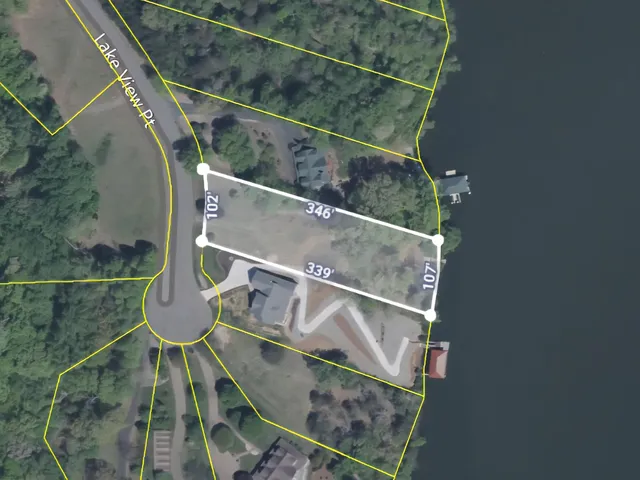 a view of a lake from a yard