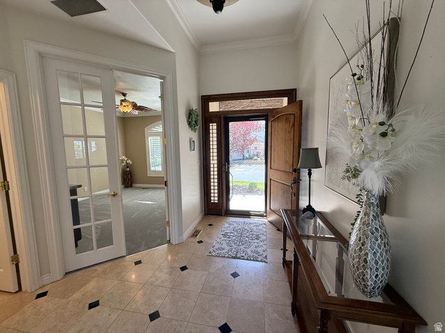 1562 Fairway Ridge Road Draper, UT 84020 - Photo 5 of 60 Entryway featuring light-toned tile flooring with dark accent squares