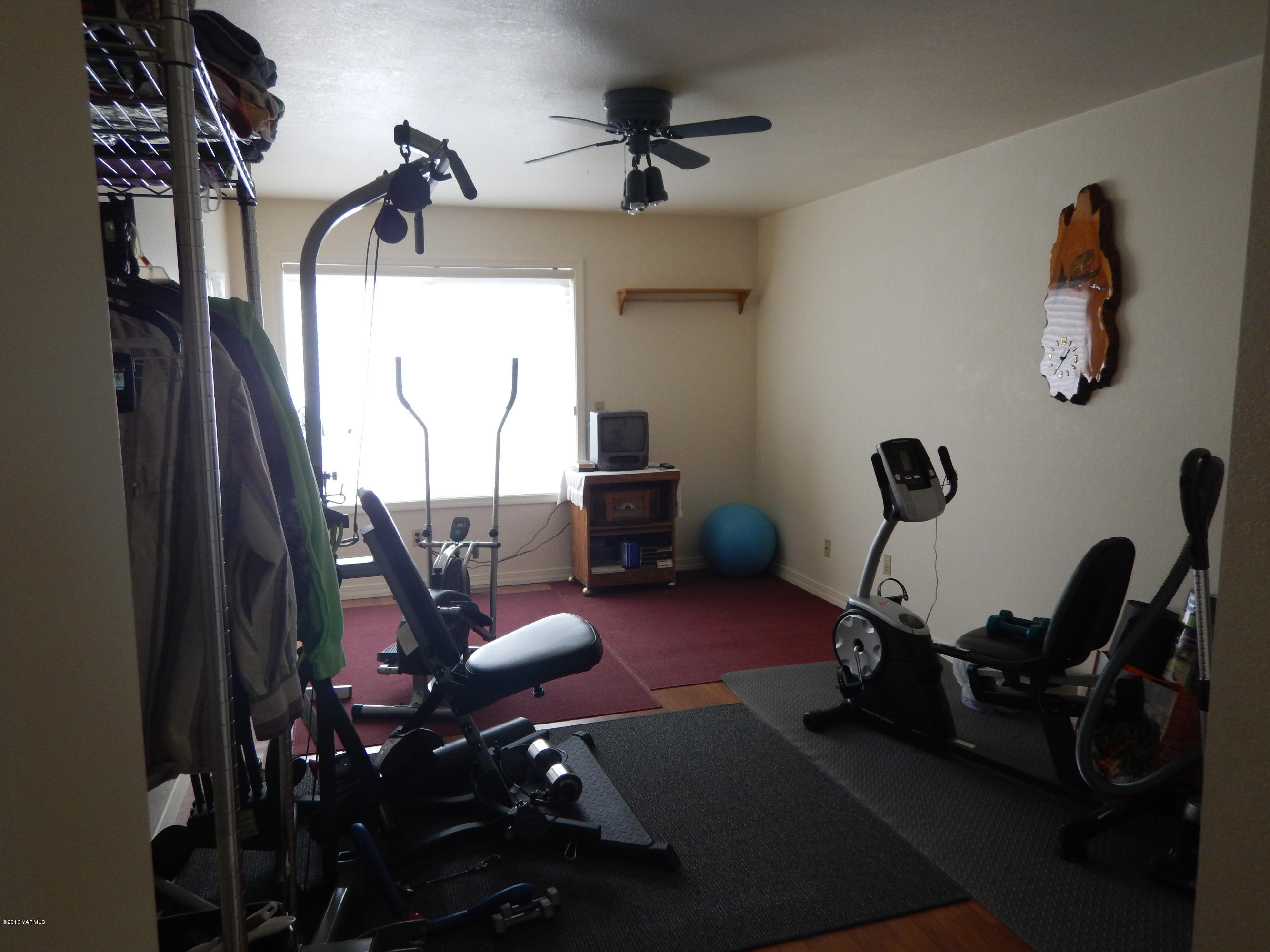 4911 Mieras Road Yakima, WA 98901 - Photo 34 of 58 a view of a workspace with furniture and a window