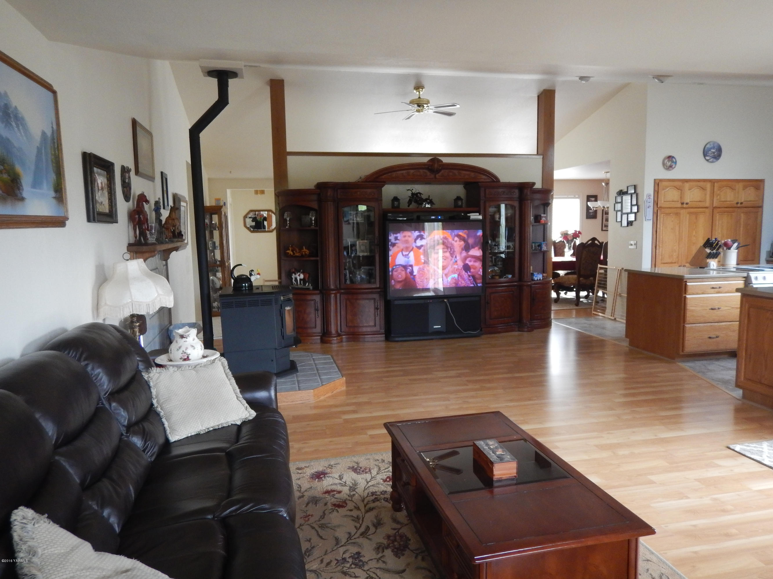 4911 Mieras Road Yakima, WA 98901 - Photo 42 of 58 a living room with furniture and a fireplace