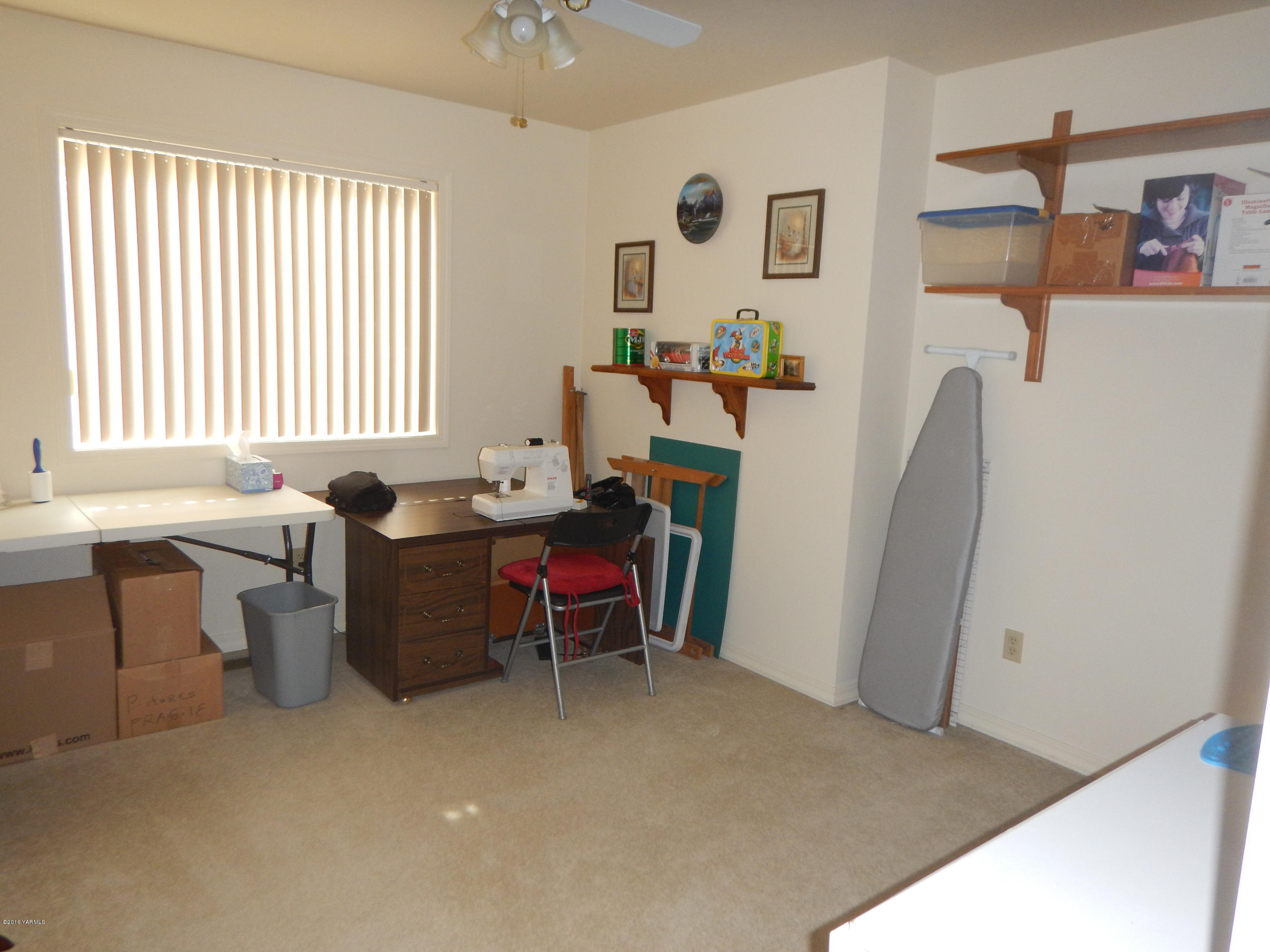 4911 Mieras Road Yakima, WA 98901 - Photo 45 of 58 a dining room with furniture and window