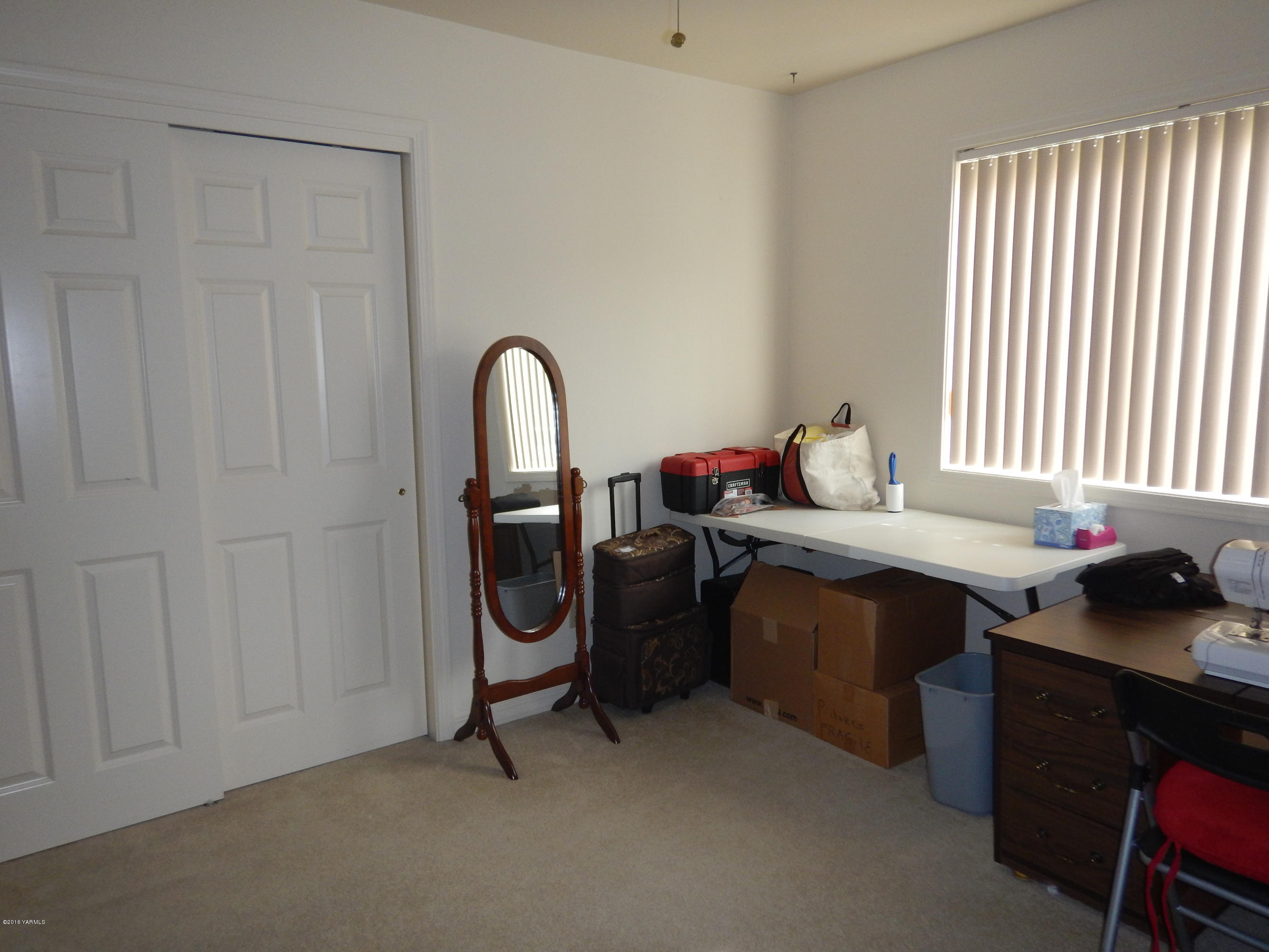 4911 Mieras Road Yakima, WA 98901 - Photo 46 of 58 a room with a workspace