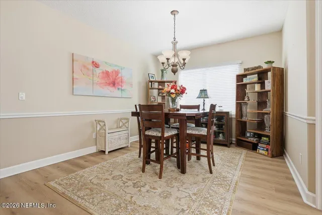 a kitchen with stainless steel appliances a refrigerator sink and cabinets