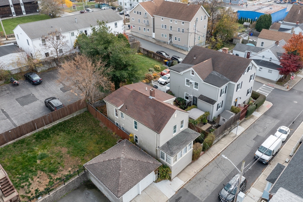 89 Oak Street Fall River, MA 02720 - Photo 34 of 39 an aerial view of a house with a yard