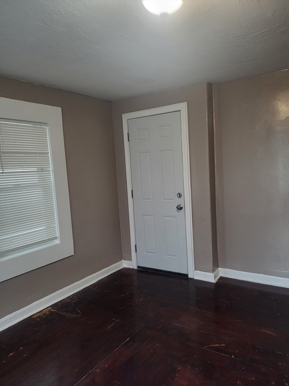 89 Oak Street Fall River, MA 02720 - Photo 10 of 39 a view of empty room with window