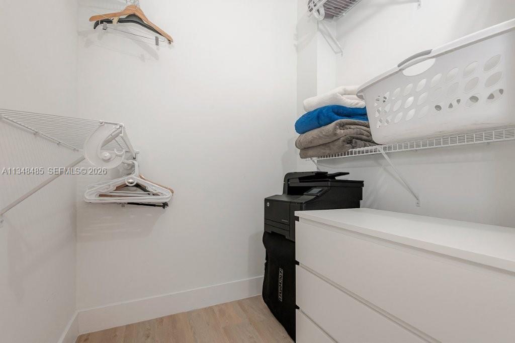 2301 Collins Avenue, Unit 927 Miami Beach, FL 33139 - Photo 26 of 30 a utility room with dryer and washer