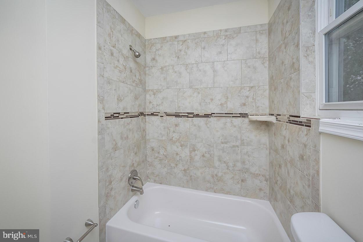 2903 Allendale Road Baltimore, MD 21216 - Photo 23 of 30 a bathroom with a bathtub