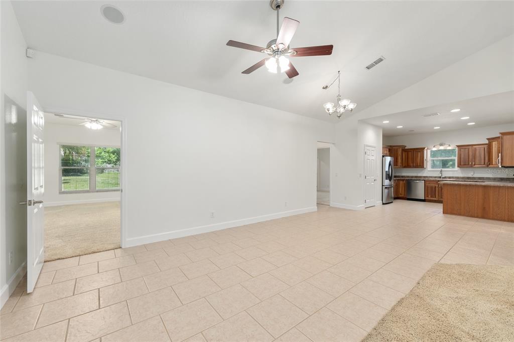 4735 Southeast 112th Street Road Belleview, FL 34420 - Photo 21 of 73 a view of a kitchen with a sink and a kitchen view