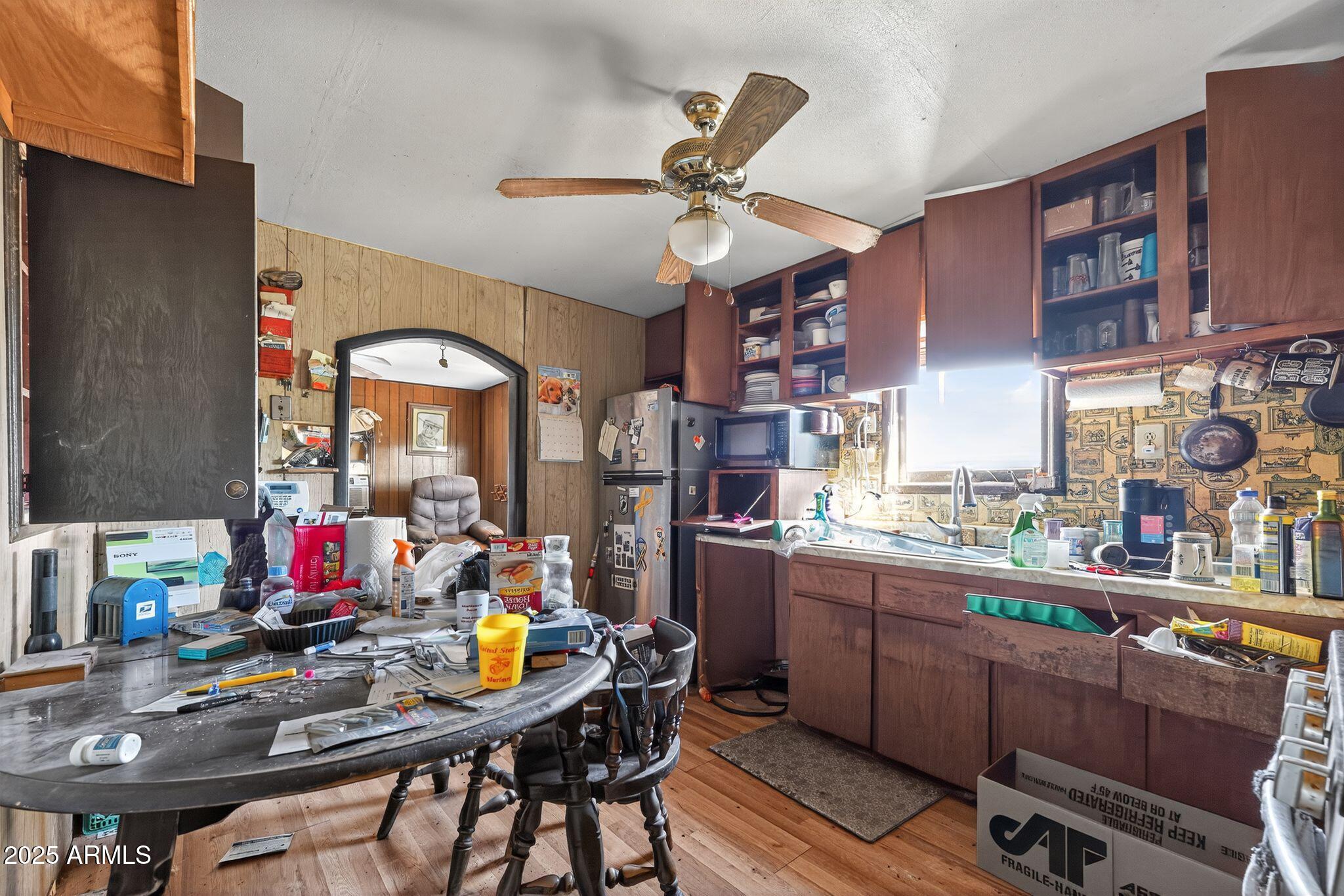 198 Randall Avenue Winkelman, AZ 85192 - Photo 11 of 30 a view of a workspace with furniture and a window
