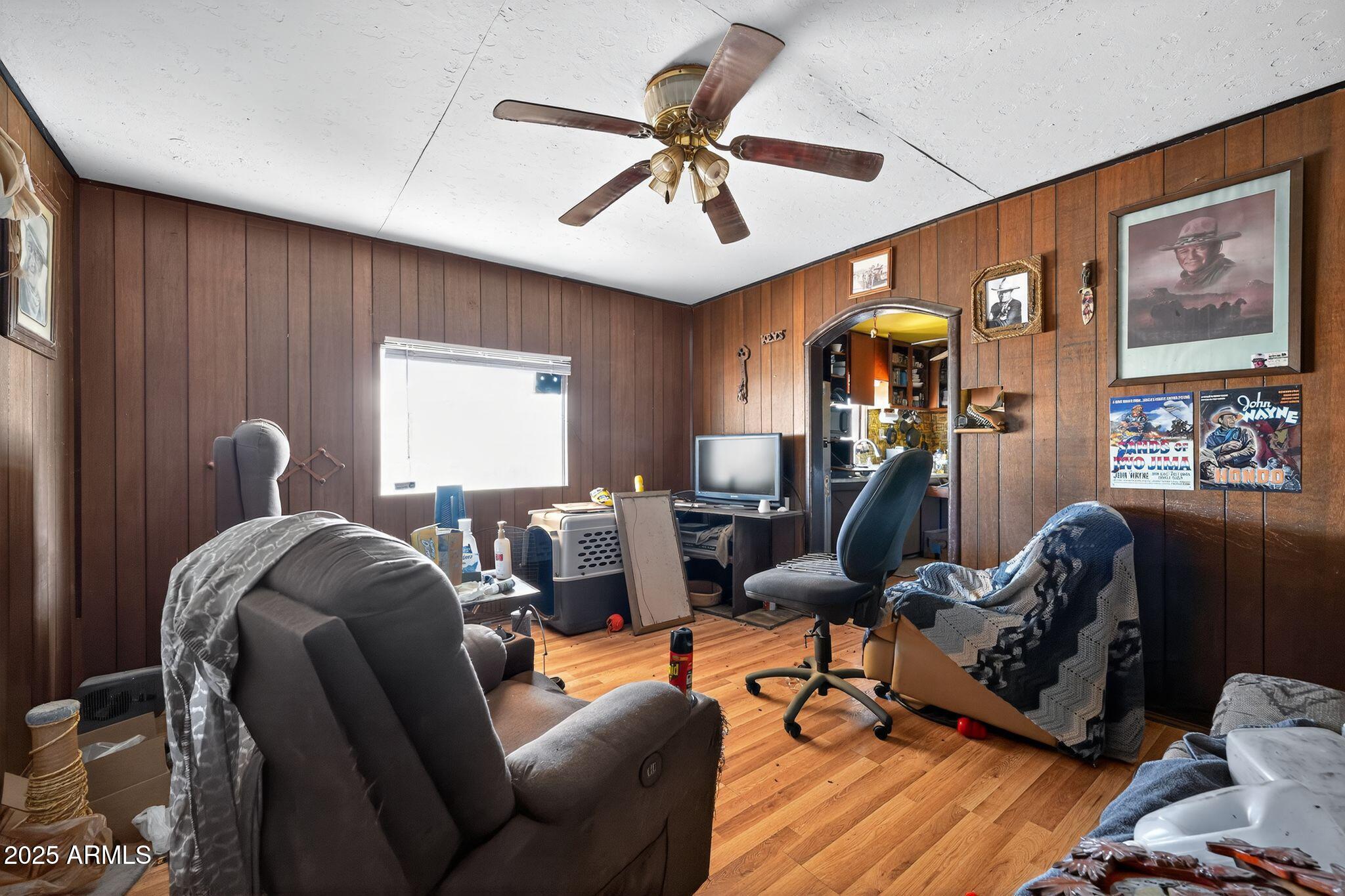 198 Randall Avenue Winkelman, AZ 85192 - Photo 27 of 30 a living room with furniture ceiling fan and a rug