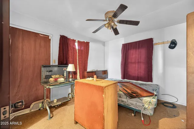 a room with furniture and a rug