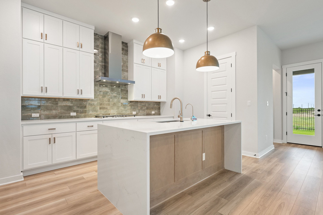 16201 Smithers Road Manor, TX 78653 - Photo 21 of 40 a kitchen with a sink cabinets and window