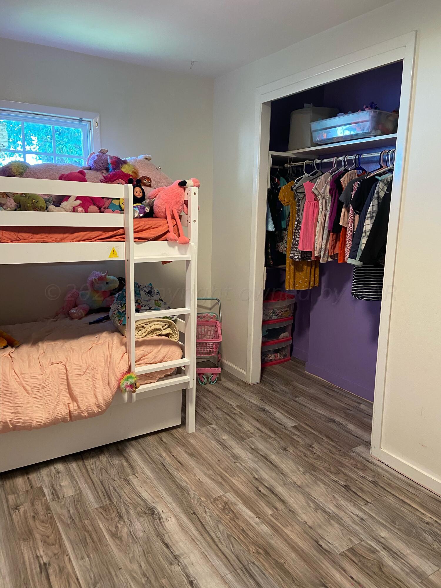 720 Santa Fe Avenue Channing, TX 79018 - Photo 12 of 23 a view of a bedroom with baby bed