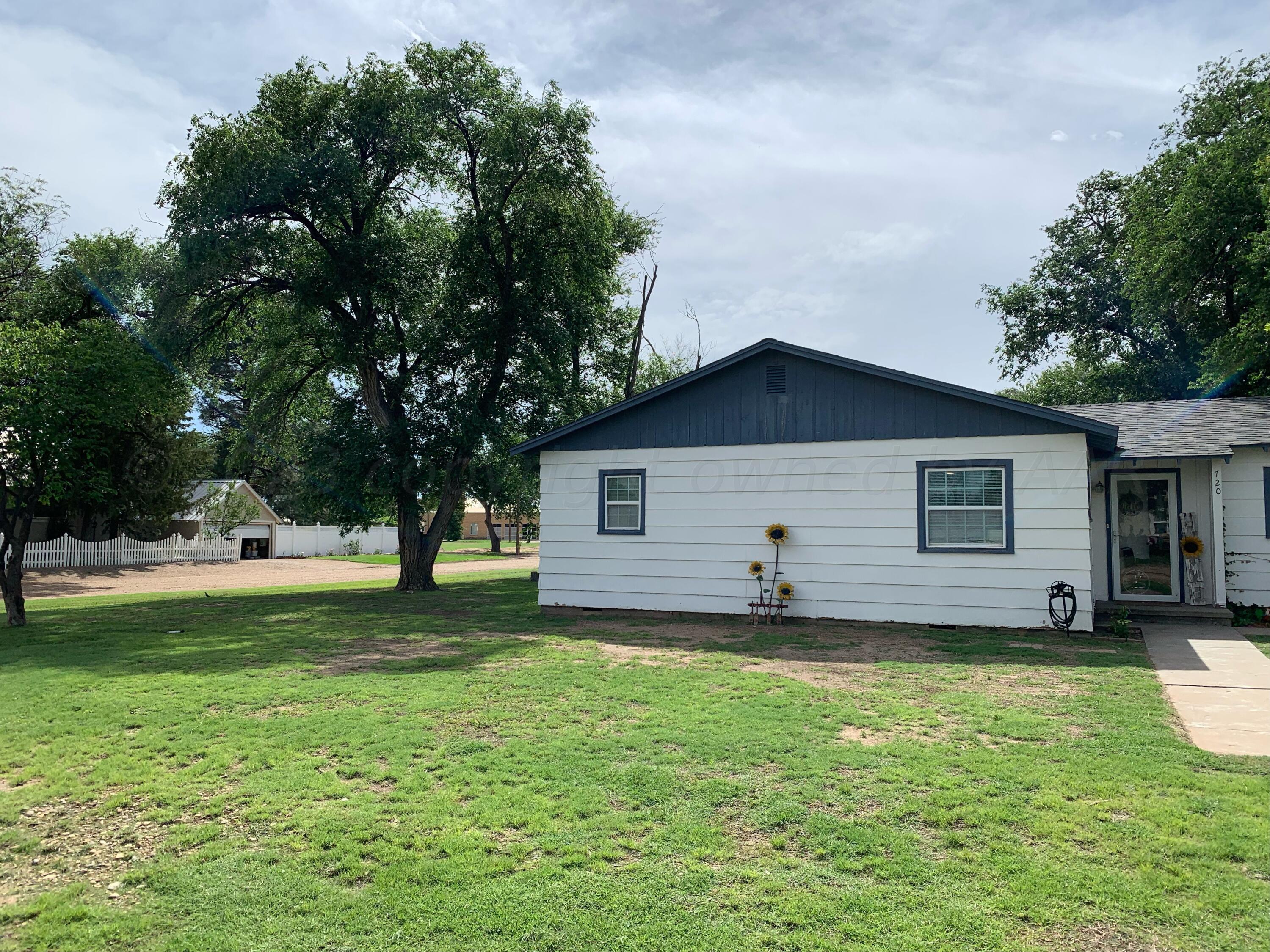 720 Santa Fe Avenue Channing, TX 79018 - Photo 2 of 23 a view of a house with a yard