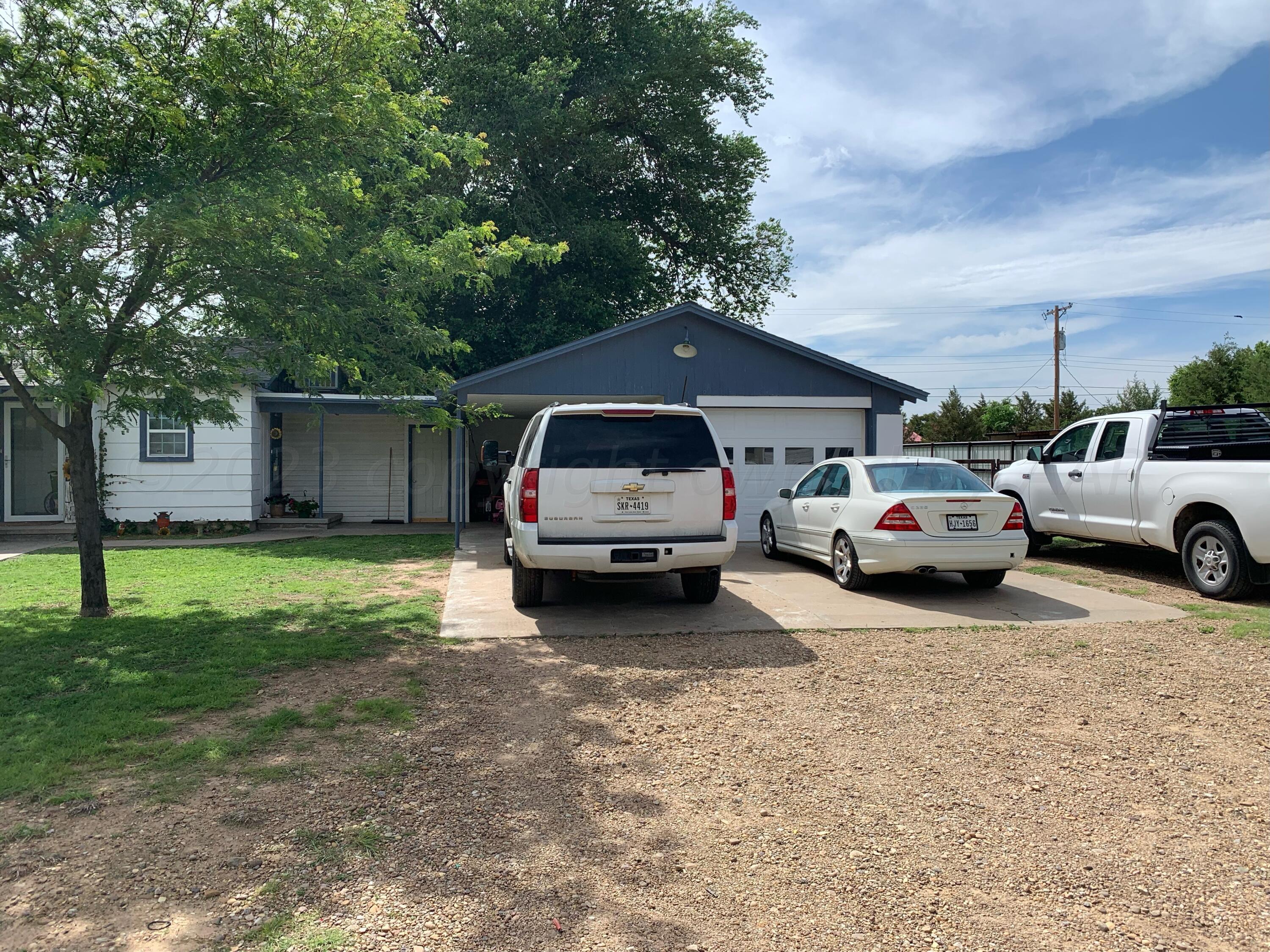 720 Santa Fe Avenue Channing, TX 79018 - Photo 23 of 23 a view of a car parked in front of a house