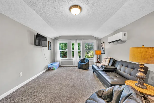 a living room with furniture and a couch