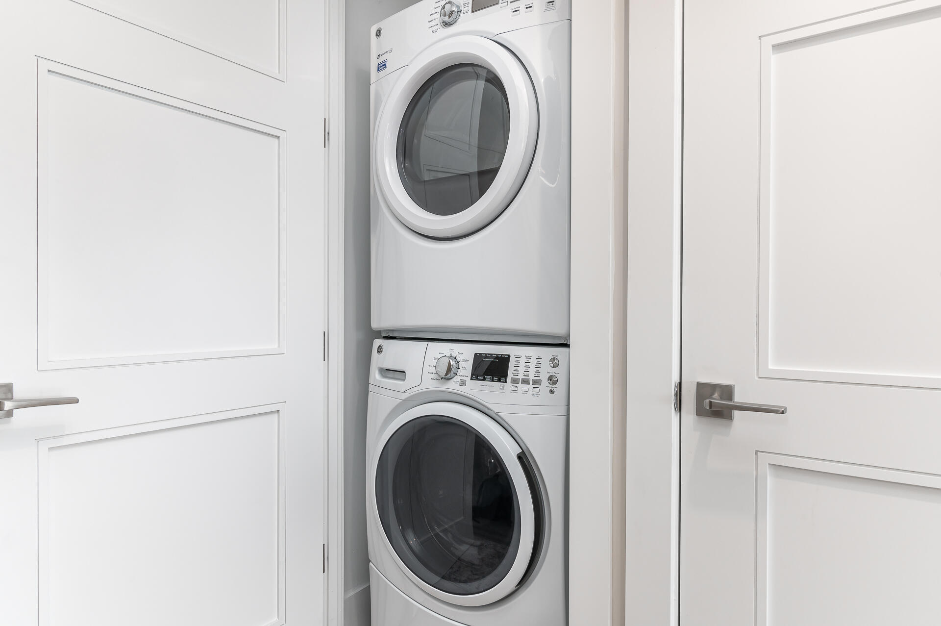 155 East Boca Raton Road, Unit 1012 Boca Raton, FL 33432 - Photo 14 of 41 a close up view of a washer and dryer