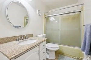 a room with furniture and screen