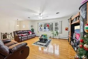 a living room with furniture and a table
