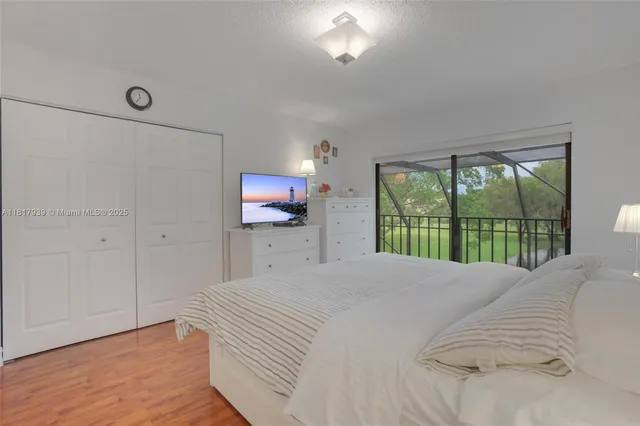 a bathroom with a granite countertop sink a shower and a mirror