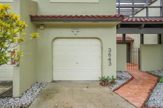 a front view of a house with entryway