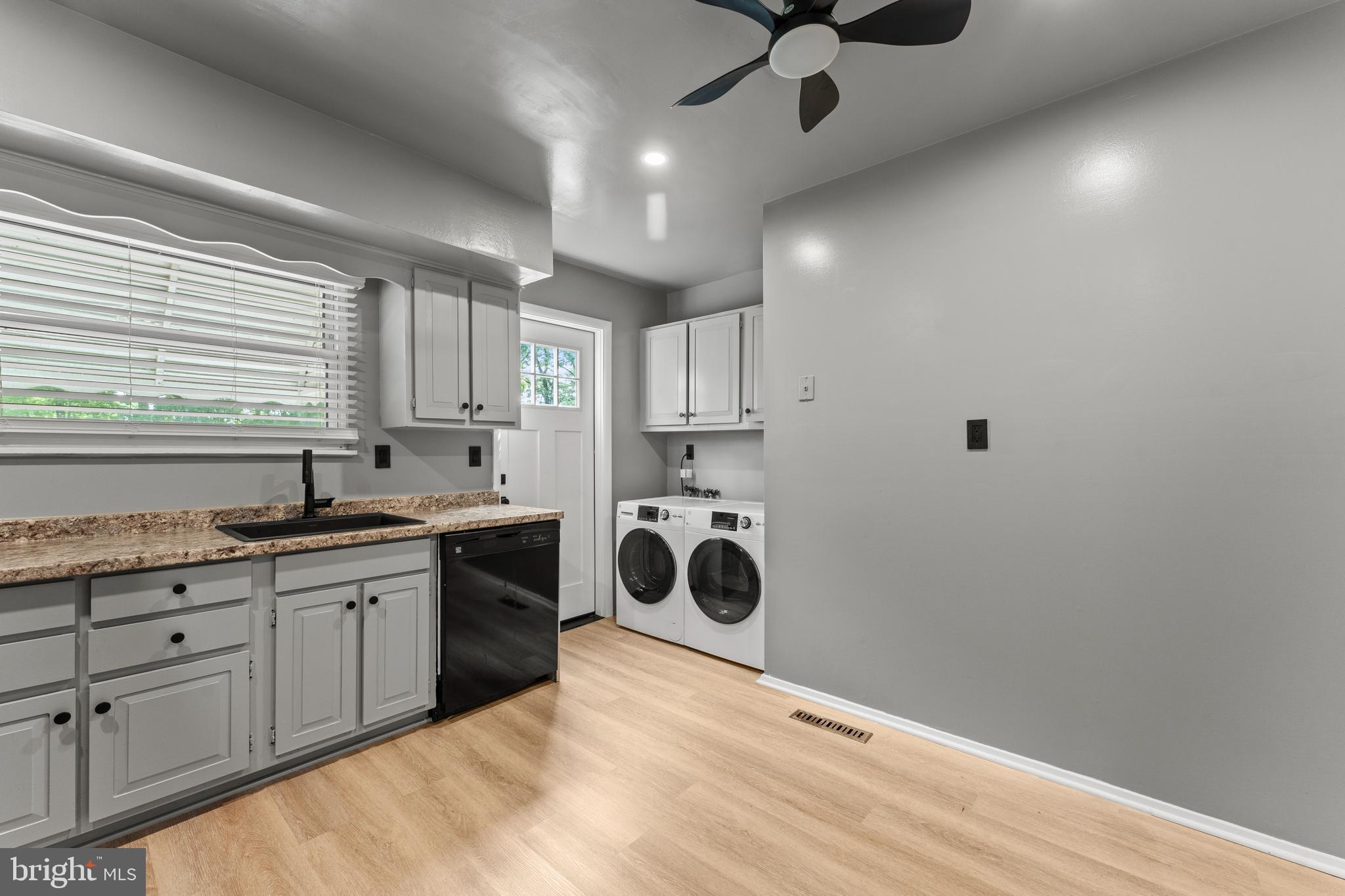 1922 Brookdale Road Baltimore, MD 21244 - Photo 9 of 33 a view of a kitchen with a sink and cabinets