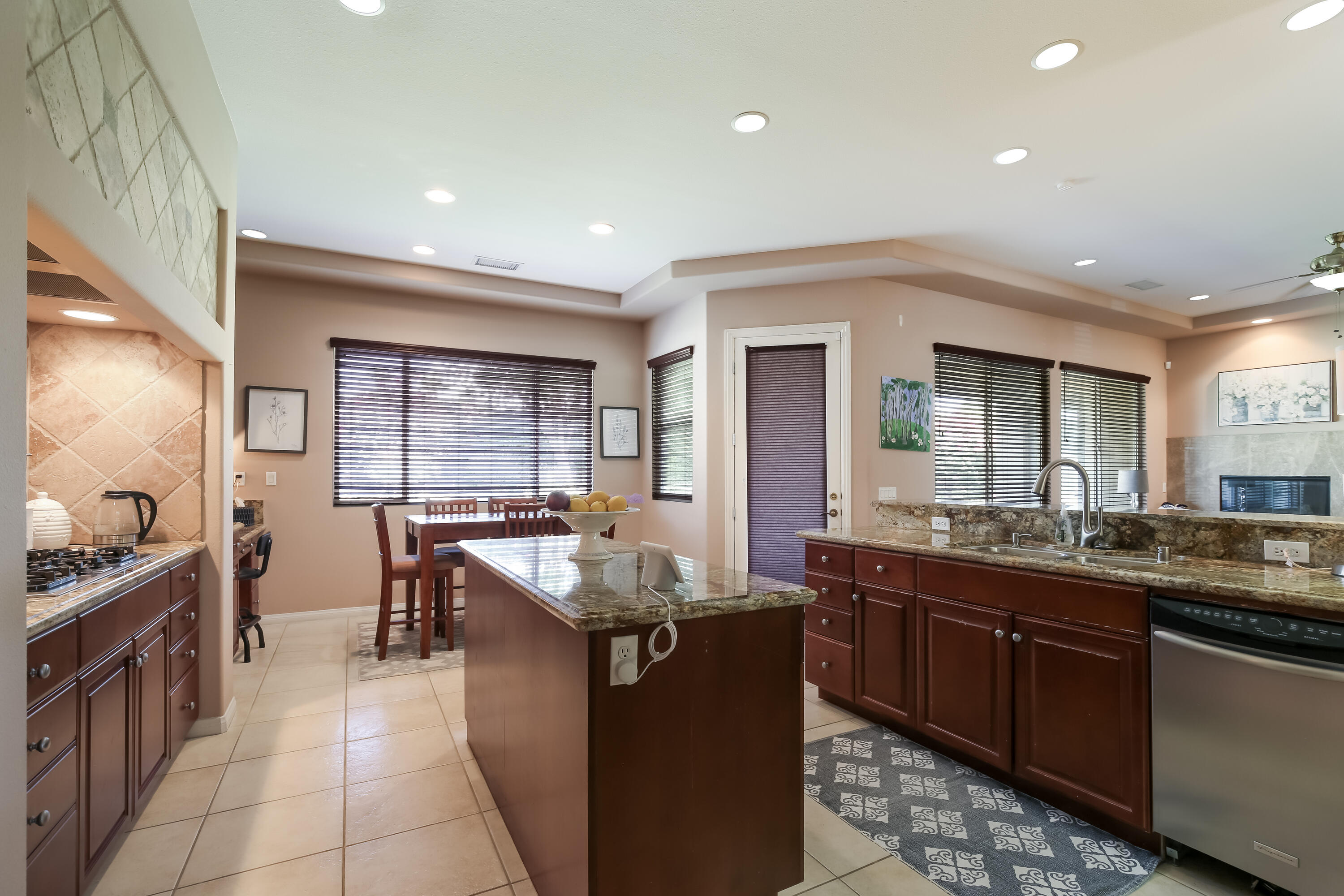 153 Bellini Way Palm Desert, CA 92211 - Photo 13 of 26 a kitchen with granite countertop lots of counter top space