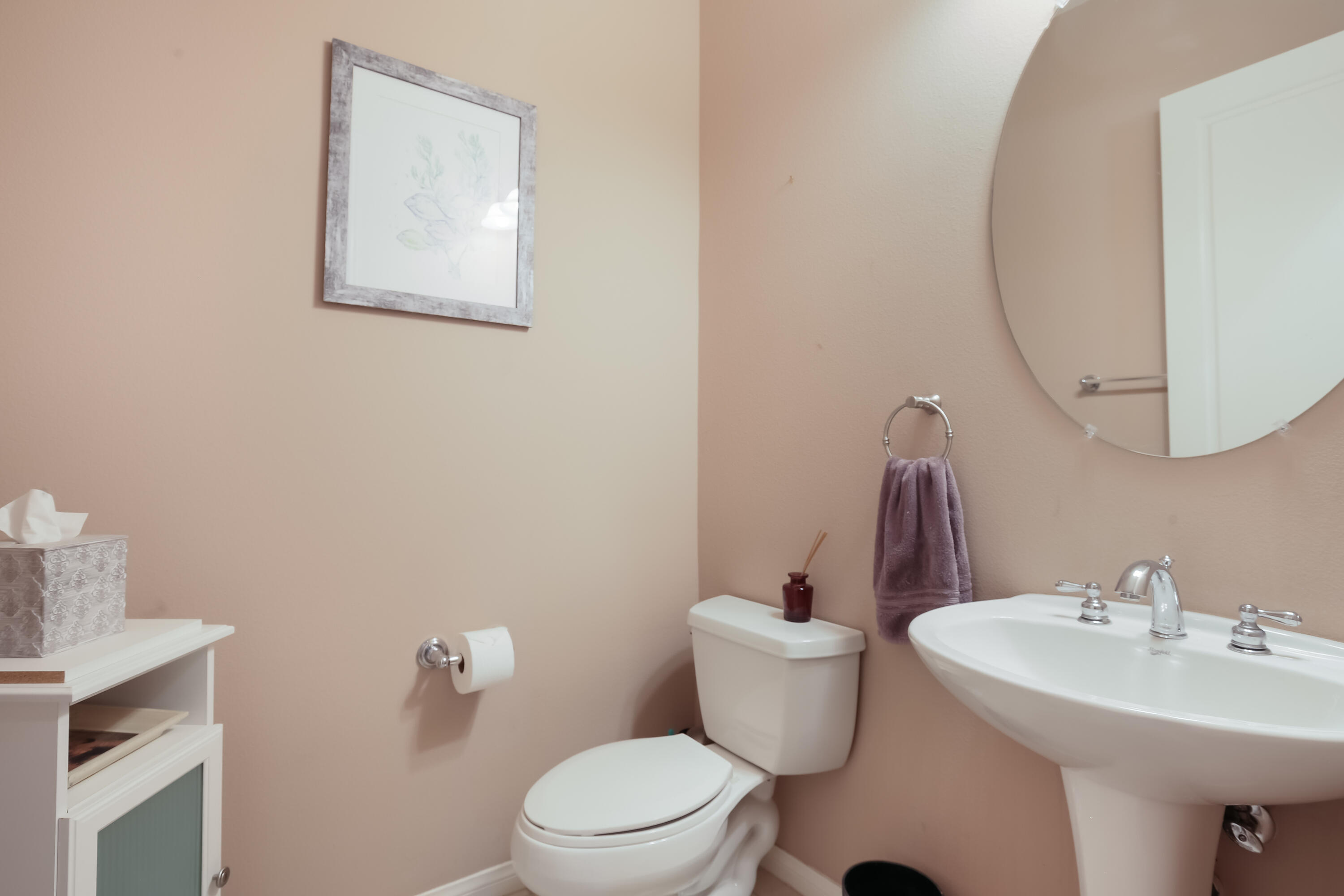 153 Bellini Way Palm Desert, CA 92211 - Photo 16 of 26 a bathroom with a sink mirror and toilet