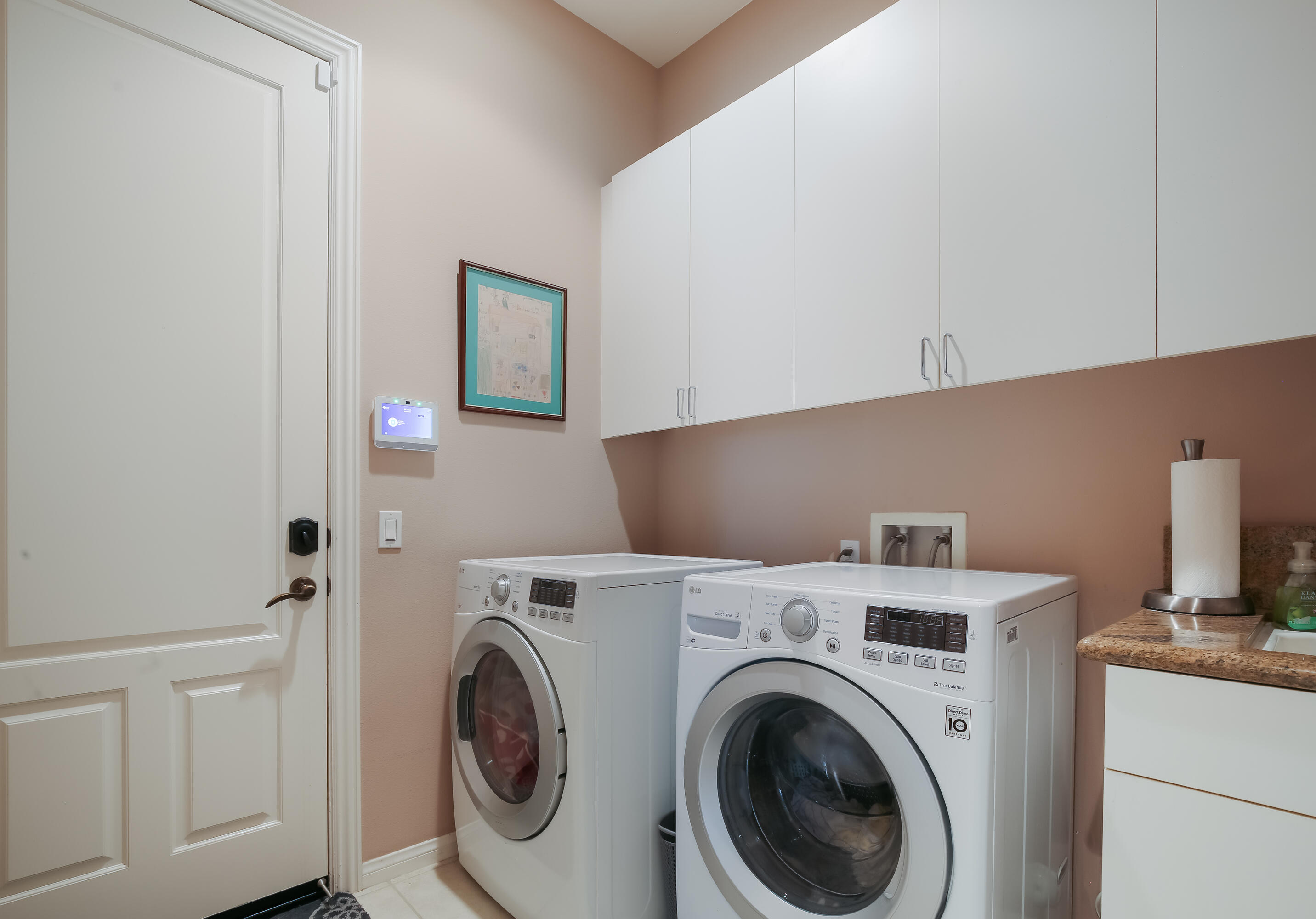 153 Bellini Way Palm Desert, CA 92211 - Photo 21 of 26 a utility room with dryer and washer