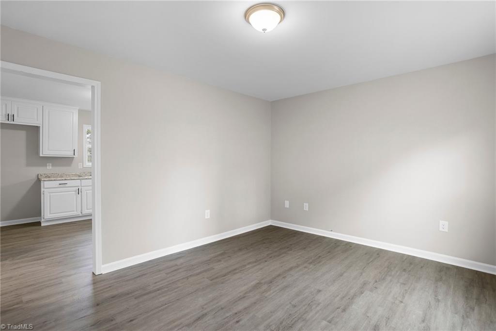 829 Blanch Road Blanch, NC 27212 - Photo 5 of 22 Living room to kitchen
