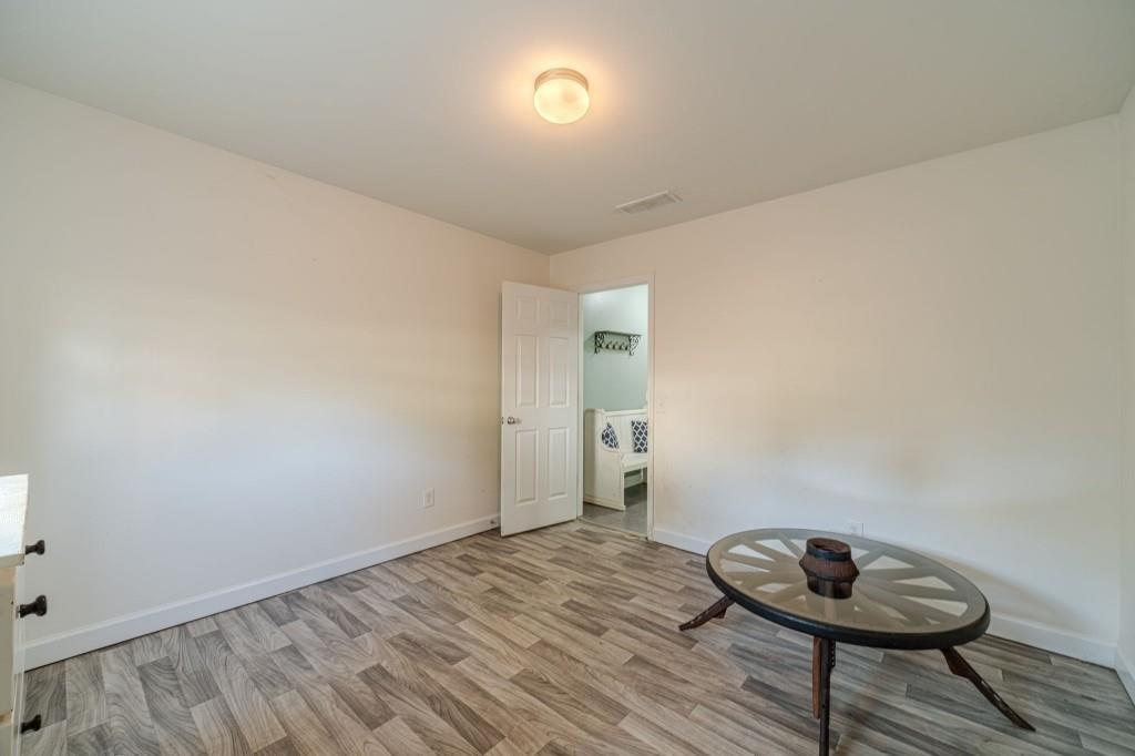 536 San Dra Way Monroe, GA 30656 - Photo 15 of 30 a view of a room with rack and wooden floor