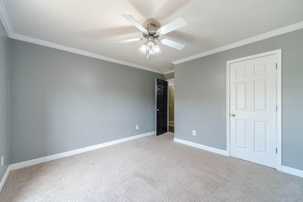 536 San Dra Way Monroe, GA 30656 - Photo 26 of 30 a view of an empty room with a ceiling fan