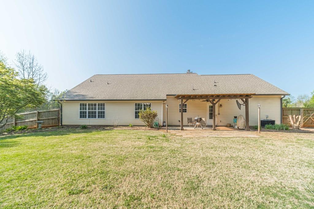 536 San Dra Way Monroe, GA 30656 - Photo 27 of 30 a house with a yard