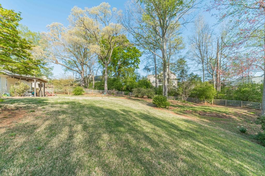 536 San Dra Way Monroe, GA 30656 - Photo 29 of 30 a view of a field with trees on the side of it