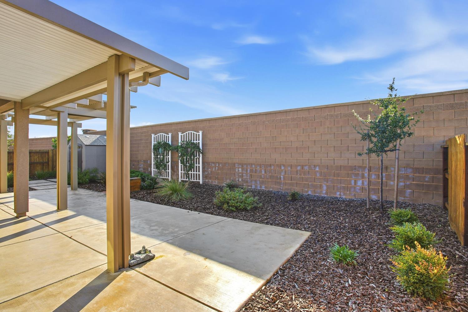 1112 Audrey Court Galt, CA 95632 - Photo 30 of 37 a view of a backyard with garden