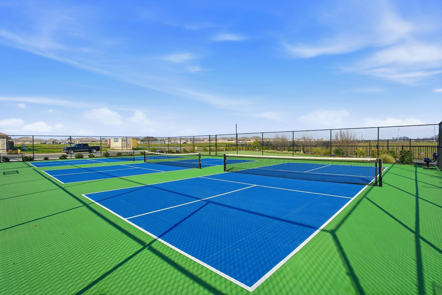 1112 Audrey Court Galt, CA 95632 - Photo 35 of 37 a view of an outdoor space and tennis court