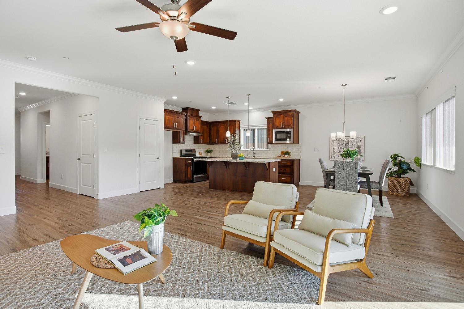 1112 Audrey Court Galt, CA 95632 - Photo 4 of 37 a living room with furniture and a wooden floor