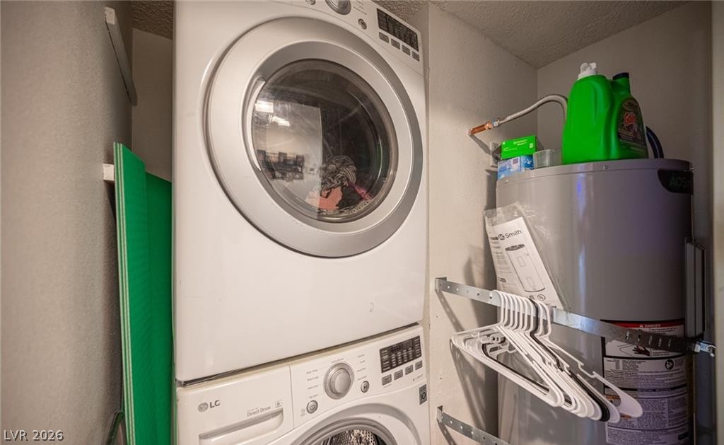 855 Del Rey Drive Boulder City, NV 89005 - Photo 4 of 12 Stacked washer and dryer unit provides efficient laundry care within a compact space.