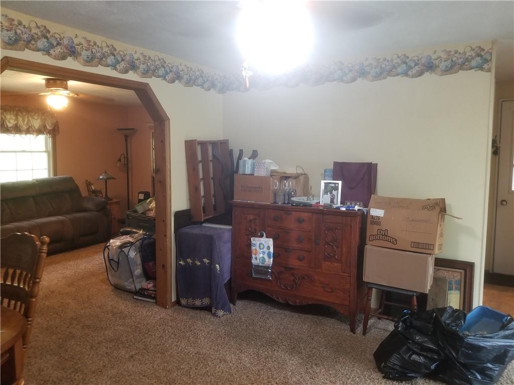 228 Summer Road Rural Valley, PA 16249 - Photo 14 of 25 a living room with furniture and a lamp