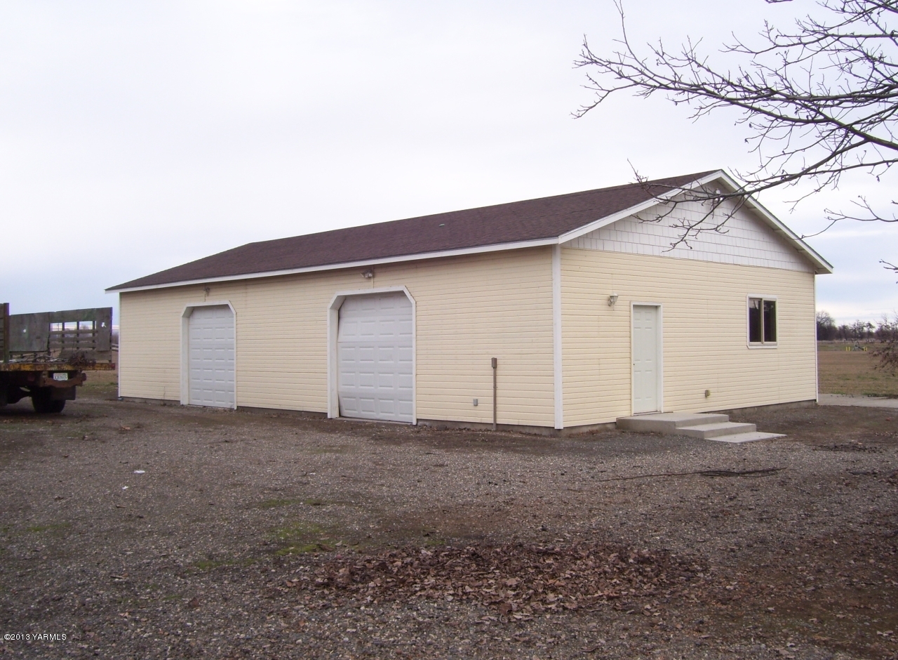 166902 West Johnson Road Prosser, WA 99350 - Photo 3 of 29 a view of a house with a garage