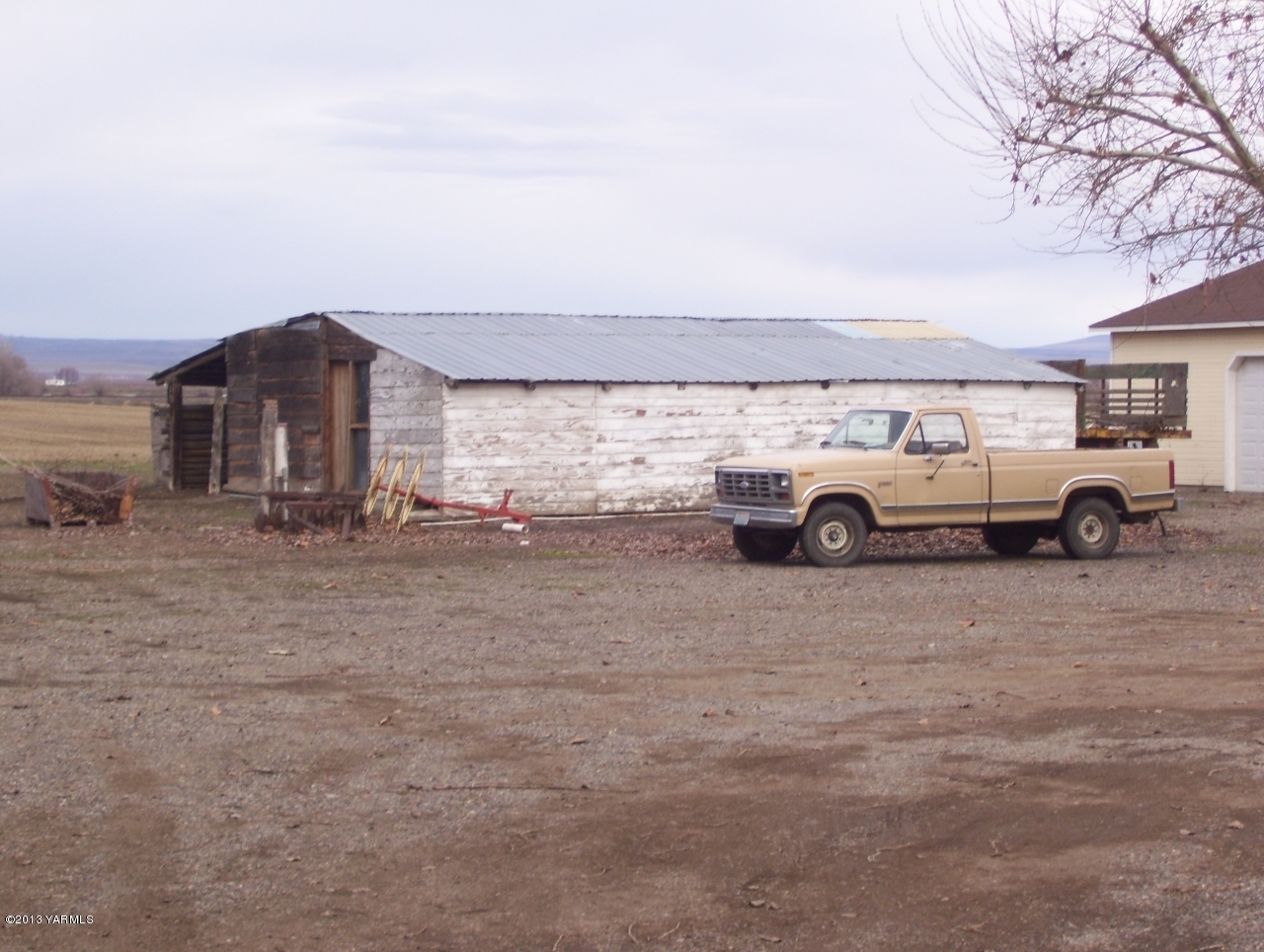 166902 West Johnson Road Prosser, WA 99350 - Photo 5 of 29 a car parked in front of a building