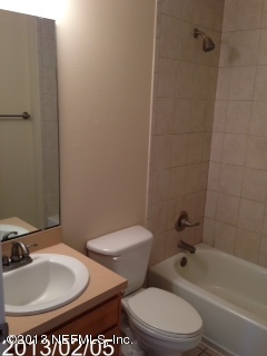 8400 F Reid Road Hastings, FL 32145 - Photo 12 of 13 a bathroom with a toilet and a sink