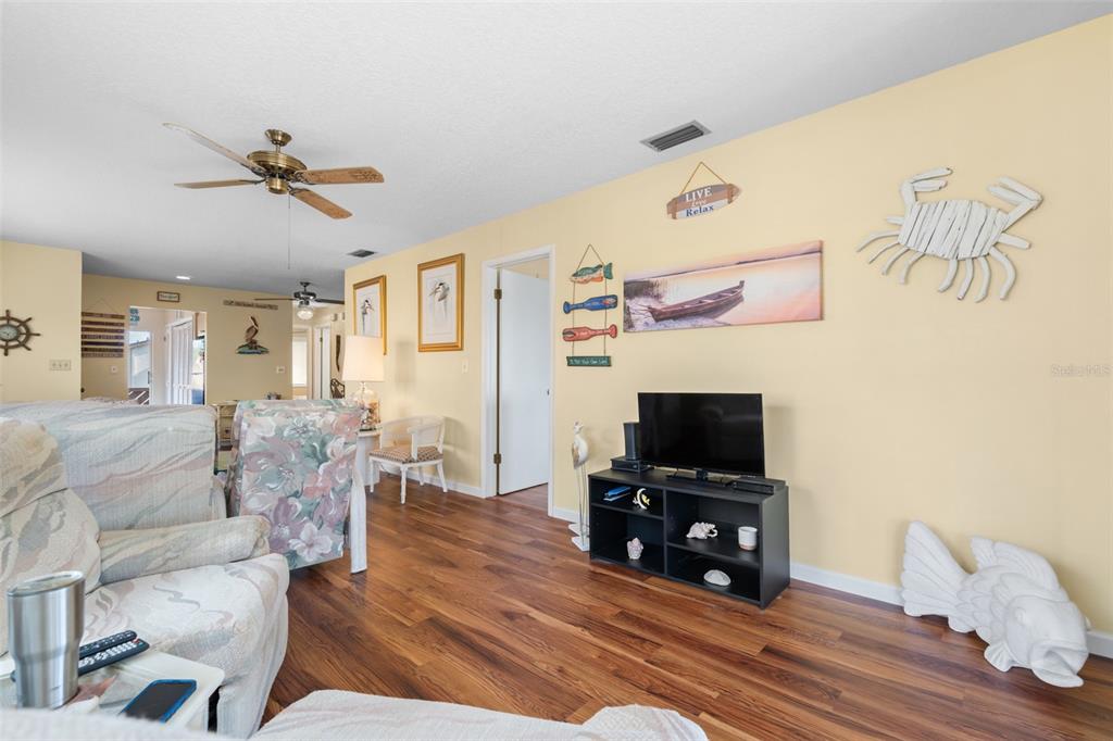4036 Davit Drive New Port Richey, FL 34652 - Photo 11 of 64 a living room with furniture and a flat screen tv